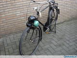 Beeldvergroting: \'...rijwiel met hulpmotor...\'